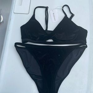 Never worn. Black velvet. Large